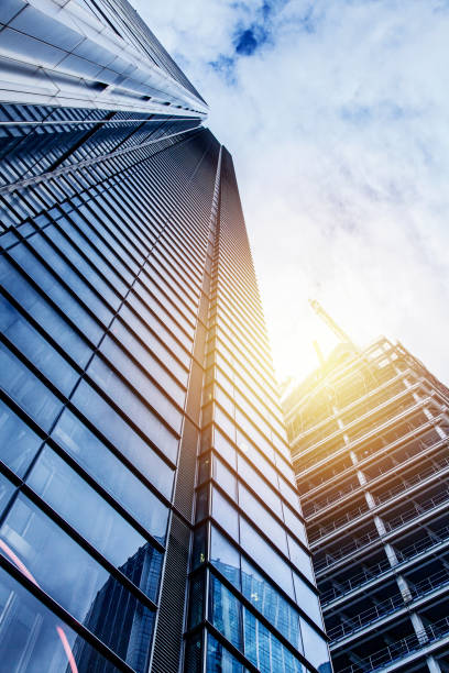 modern-glass-silhouettes-of-skyscrapers.jpg?s=612x612&w=0&k=20&c=h4JDj_Co_hgzFpPJWUvR6AoqiLsR6p2dbsE_dSMXb-0=